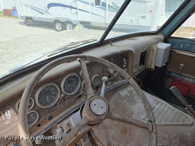 image for item EM7164 1981 GMC Brigadier flatbed truck with mud mixing system