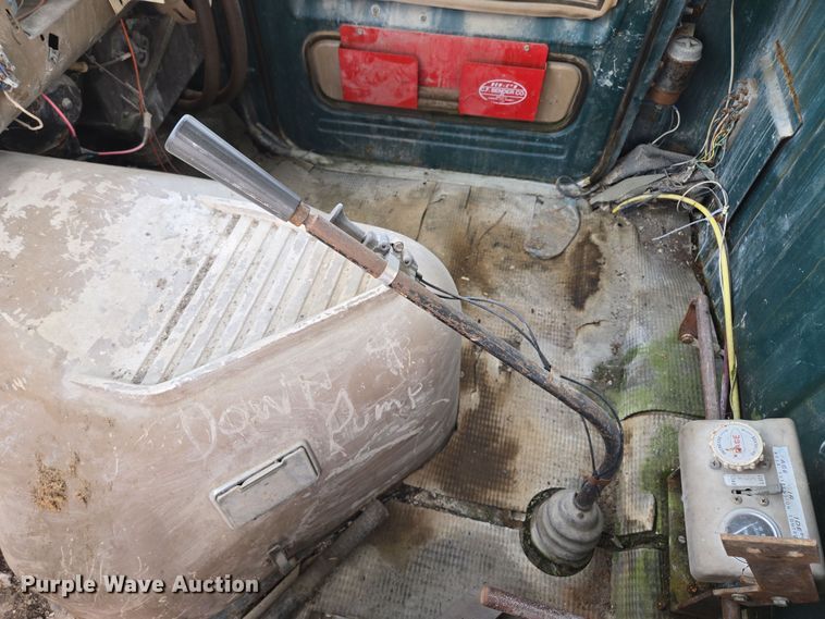 image for item EM7164 1981 GMC Brigadier flatbed truck with mud mixing system