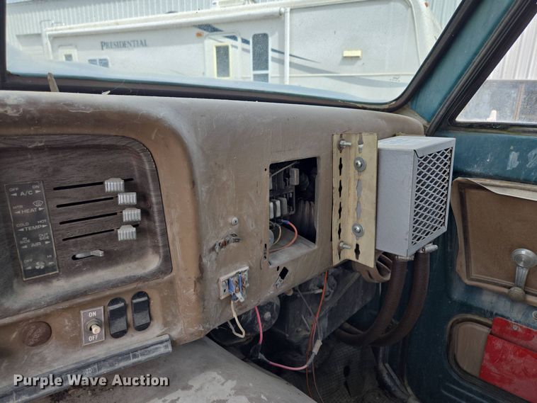 image for item EM7164 1981 GMC Brigadier flatbed truck with mud mixing system