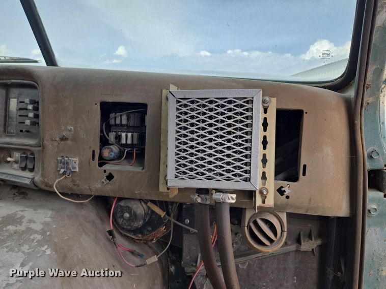 image for item EM7164 1981 GMC Brigadier flatbed truck with mud mixing system