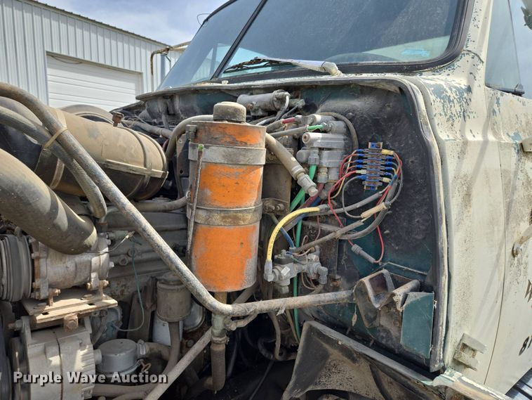 image for item EM7164 1981 GMC Brigadier flatbed truck with mud mixing system