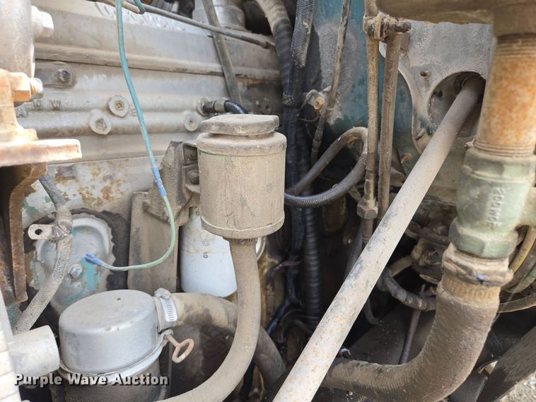 image for item EM7164 1981 GMC Brigadier flatbed truck with mud mixing system