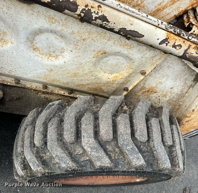 image for item EN4511 Bobcat M-700 skid steer loader