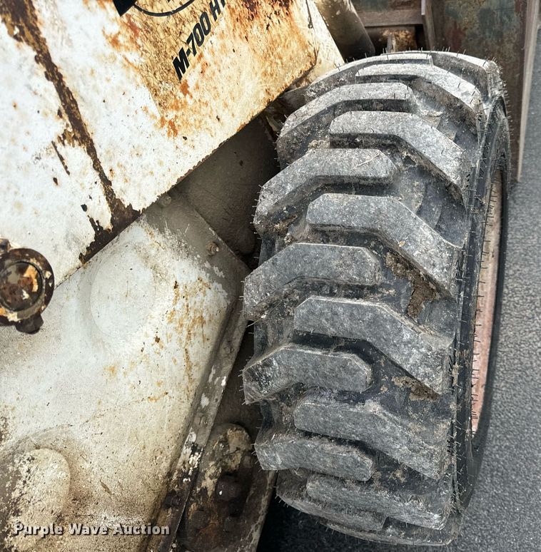 image for item EN4511 Bobcat M-700 skid steer loader