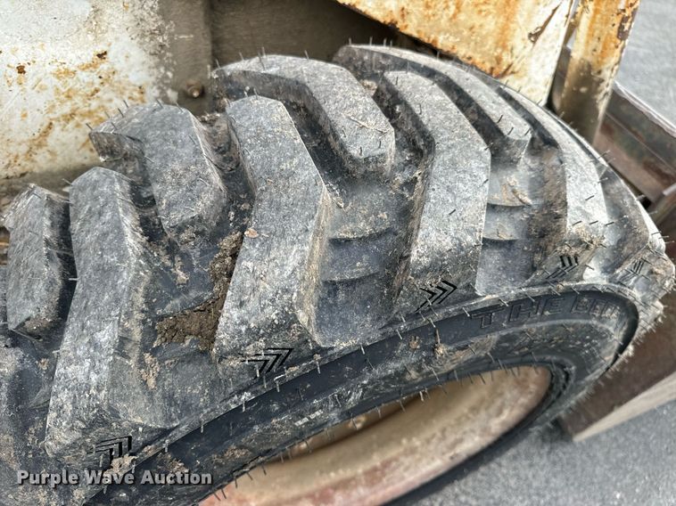 image for item EN4511 Bobcat M-700 skid steer loader