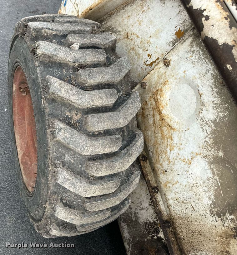 image for item EN4511 Bobcat M-700 skid steer loader