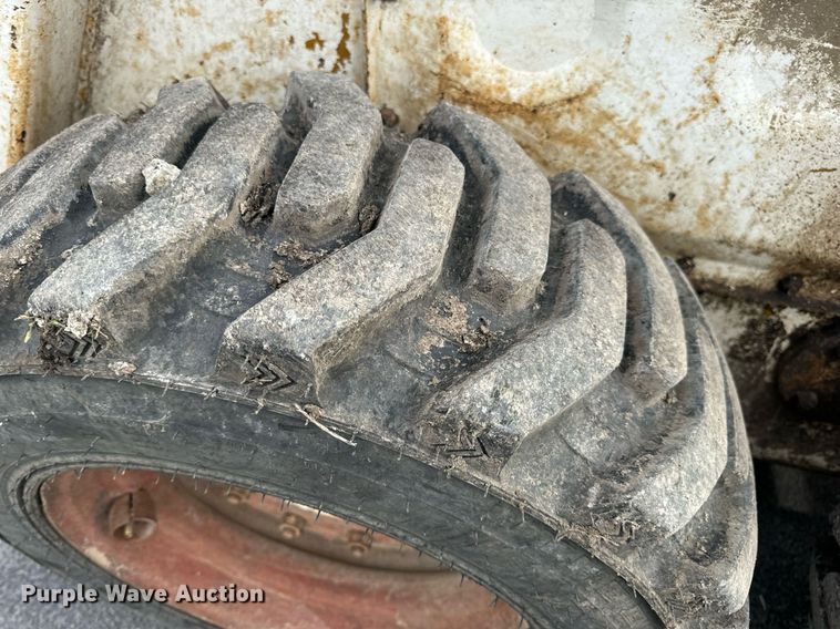 image for item EN4511 Bobcat M-700 skid steer loader