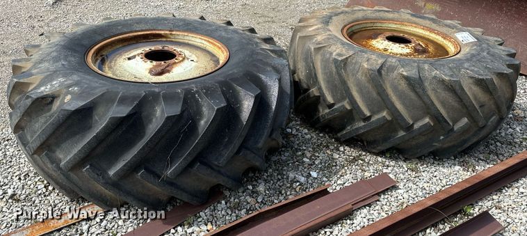 image for item DV1959 (2) 24.5-32 tires and wheels