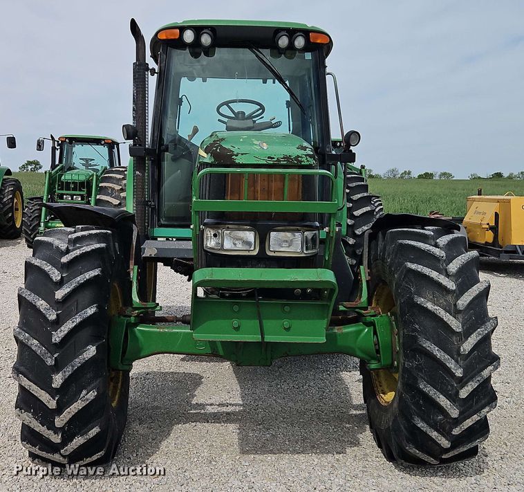 image for item EB8012 2004 John Deere 7320 MFWD tractor