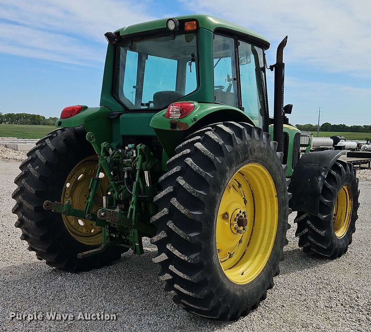 image for item EB8012 2004 John Deere 7320 MFWD tractor