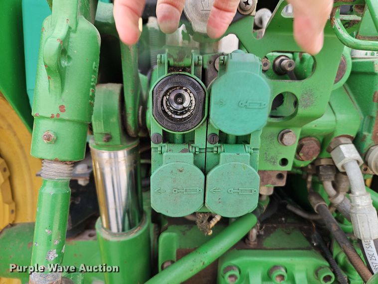 image for item EB8012 2004 John Deere 7320 MFWD tractor