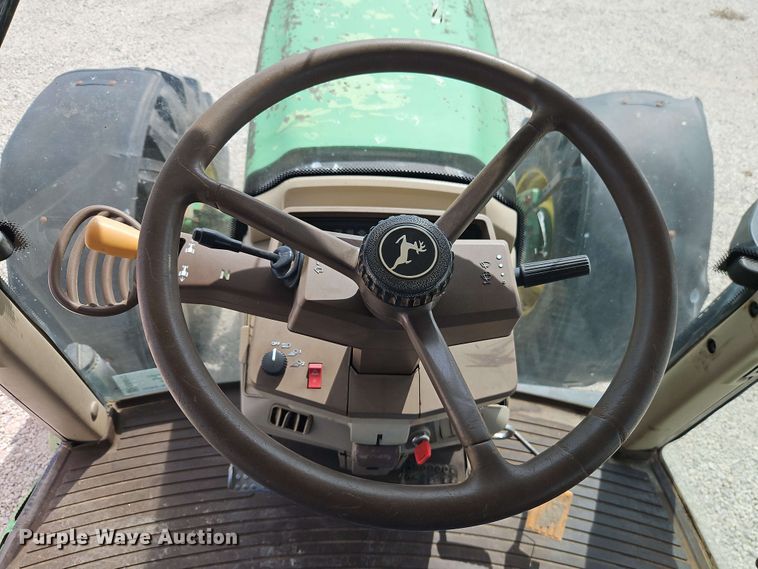image for item EB8012 2004 John Deere 7320 MFWD tractor