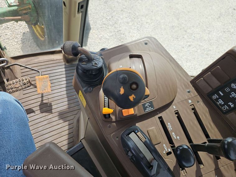 image for item EB8012 2004 John Deere 7320 MFWD tractor