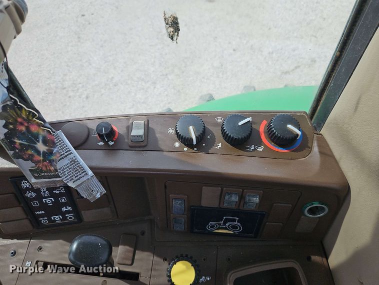 image for item EB8012 2004 John Deere 7320 MFWD tractor