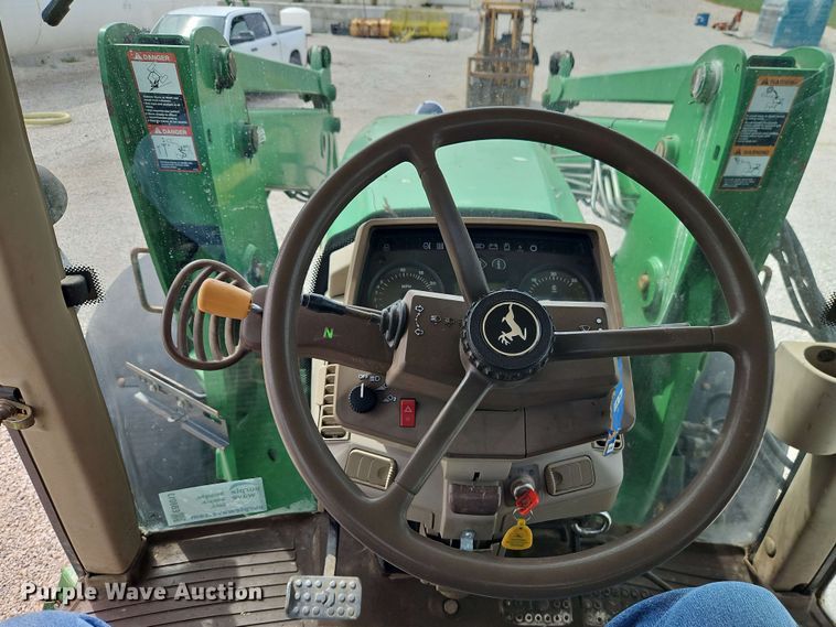 image for item EB8013 2004 John Deere 7320 MFWD tractor