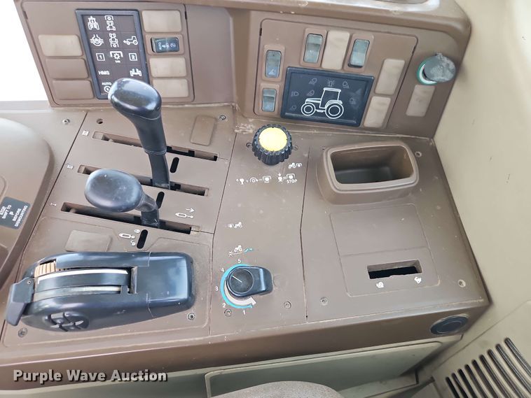 image for item EB8013 2004 John Deere 7320 MFWD tractor