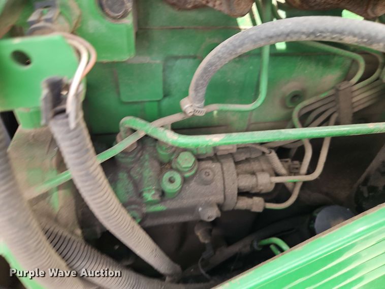 image for item EB8013 2004 John Deere 7320 MFWD tractor