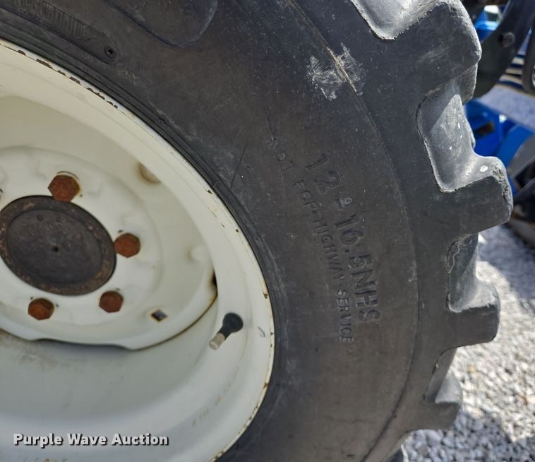 image for item EJ7512 2007 New Holland T2420 MFWD tractor