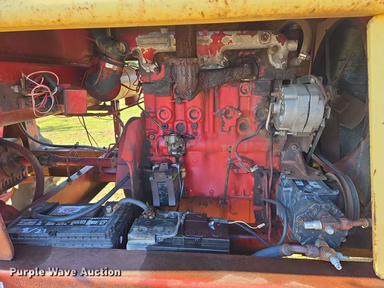 image for item EN8968 1983 New Holland  1116 swather / windrower