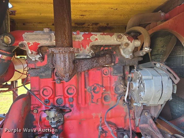 image for item EN8968 1983 New Holland  1116 swather / windrower