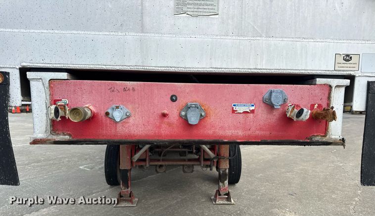 image for item DV4009 2010 Mac end dump trailer