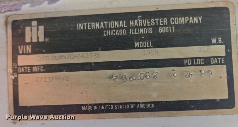 image for item EC4196 1986 International 1954 hook lift truck