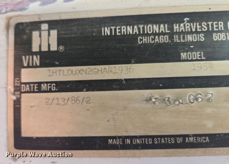 image for item EC4196 1986 International 1954 hook lift truck