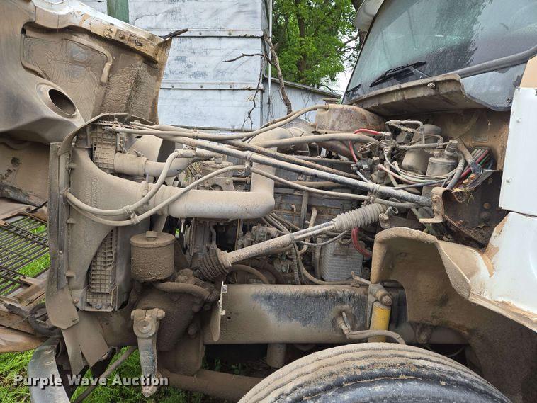 image for item EN8962 1998 Freightliner FL112 semi truck