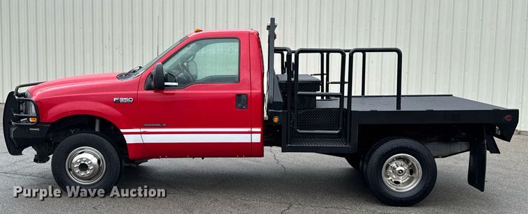 image for item DO0749 2002 Ford F350 Super Duty flatbed pickup truck