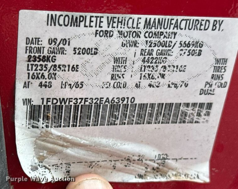 image for item DO0749 2002 Ford F350 Super Duty flatbed pickup truck