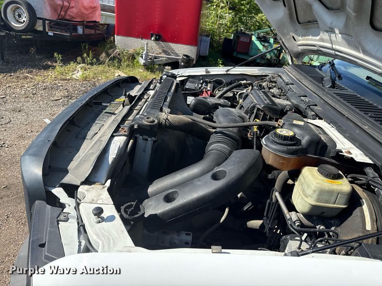 image for item DZ4051 2006 Ford F350 Super Duty flatbed pickup truck