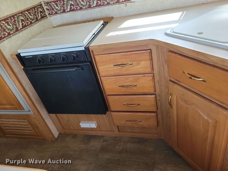 image for item EA2440 2003 Keystone Sprinter camper