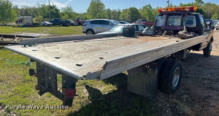 image for item EJ8678 1988 Ford F450 Super Duty rollback truck