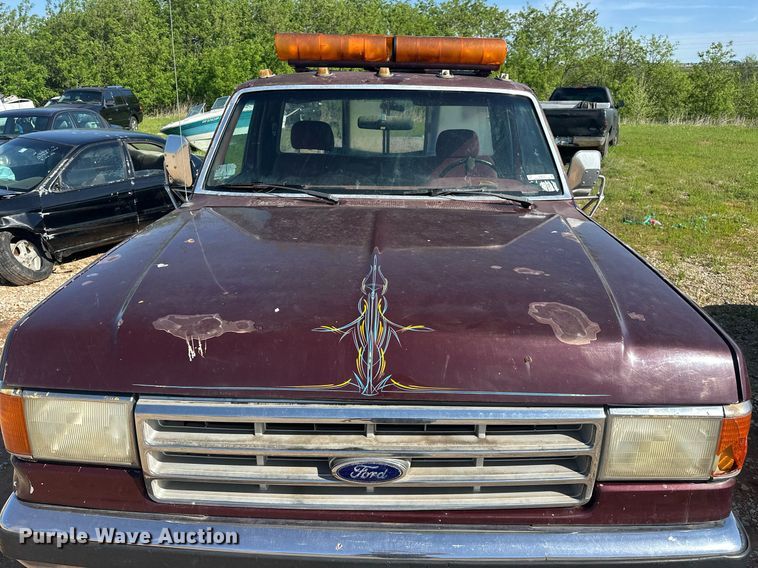 image for item EJ8678 1988 Ford F450 Super Duty rollback truck