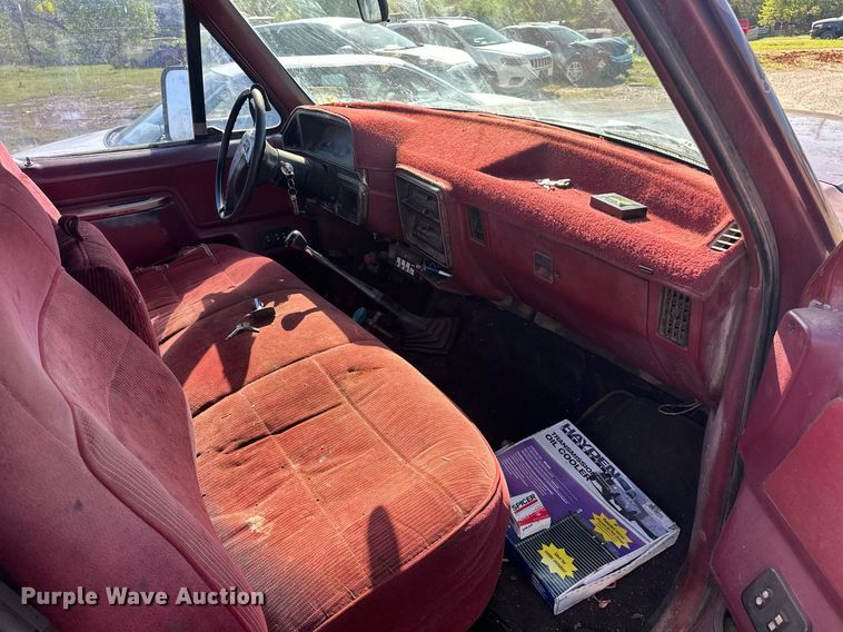 image for item EJ8678 1988 Ford F450 Super Duty rollback truck