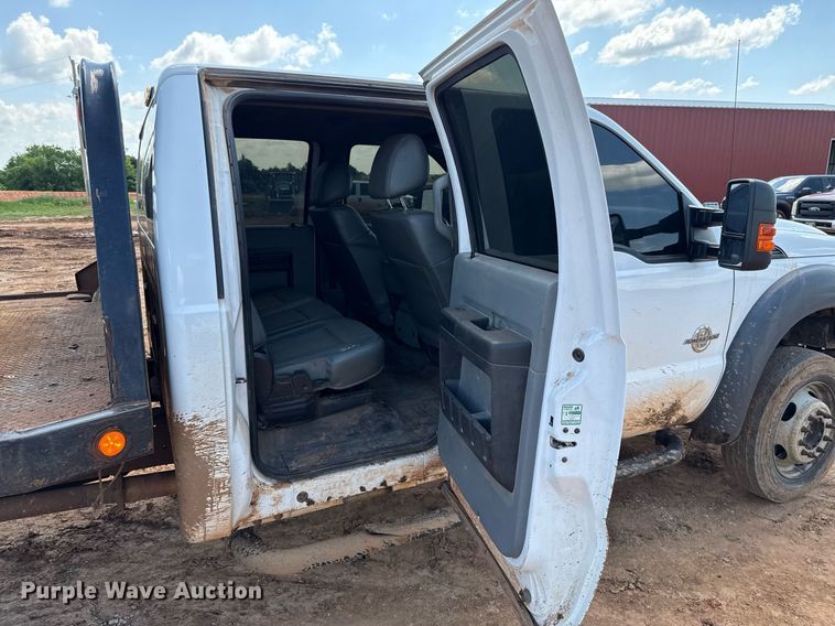 image for item EJ8774 2014 Ford F550 Crew Cab flatbed truck