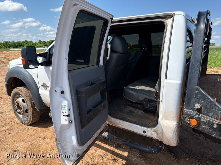 image for item EJ8774 2014 Ford F550 Crew Cab flatbed truck