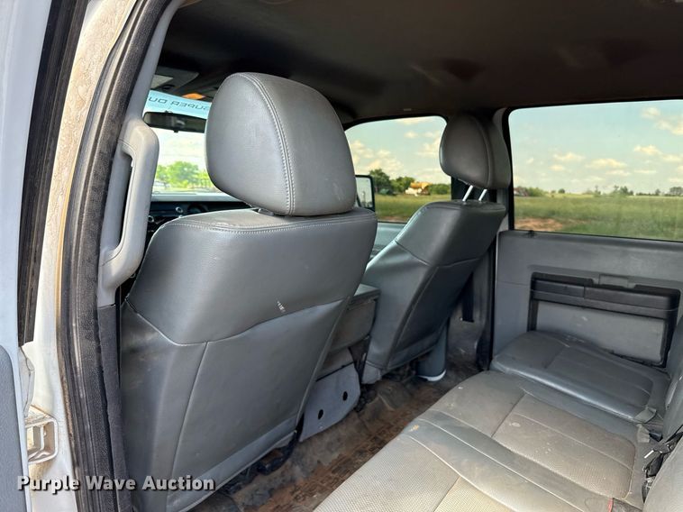 image for item EJ8774 2014 Ford F550 Crew Cab flatbed truck