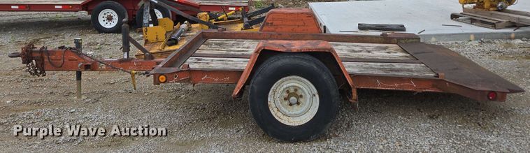 image for item EN3688 1986 The Charles Machine Works S4A tilt deck utility trailer