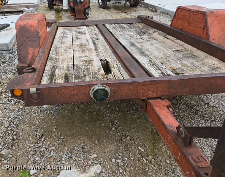 image for item EN3688 1986 The Charles Machine Works S4A tilt deck utility trailer