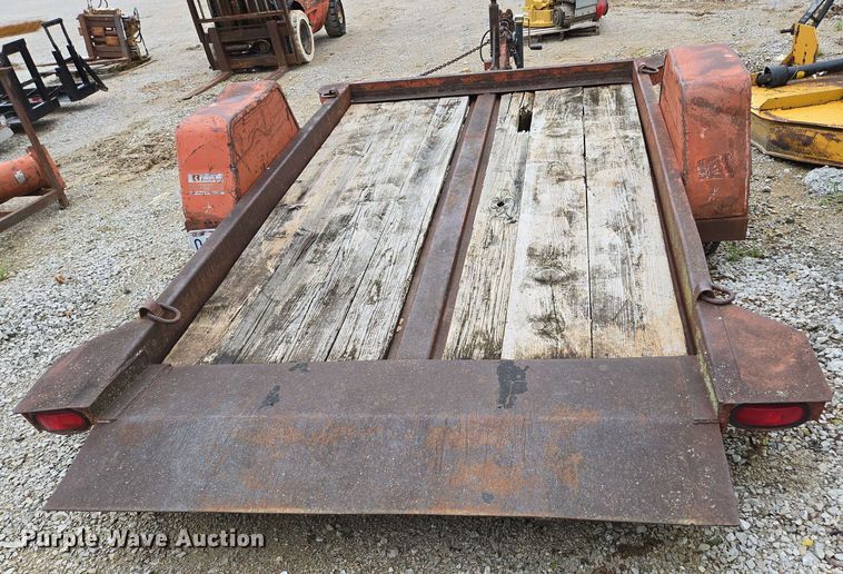 image for item EN3688 1986 The Charles Machine Works S4A tilt deck utility trailer