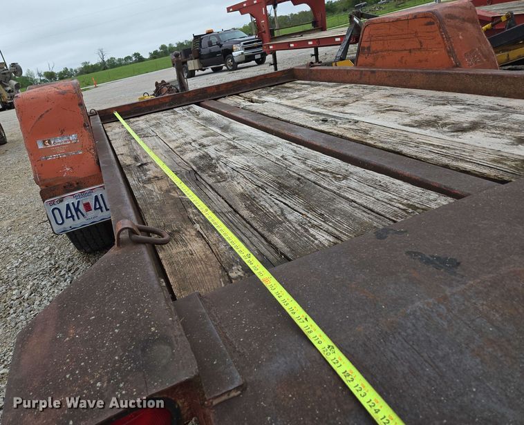 image for item EN3688 1986 The Charles Machine Works S4A tilt deck utility trailer