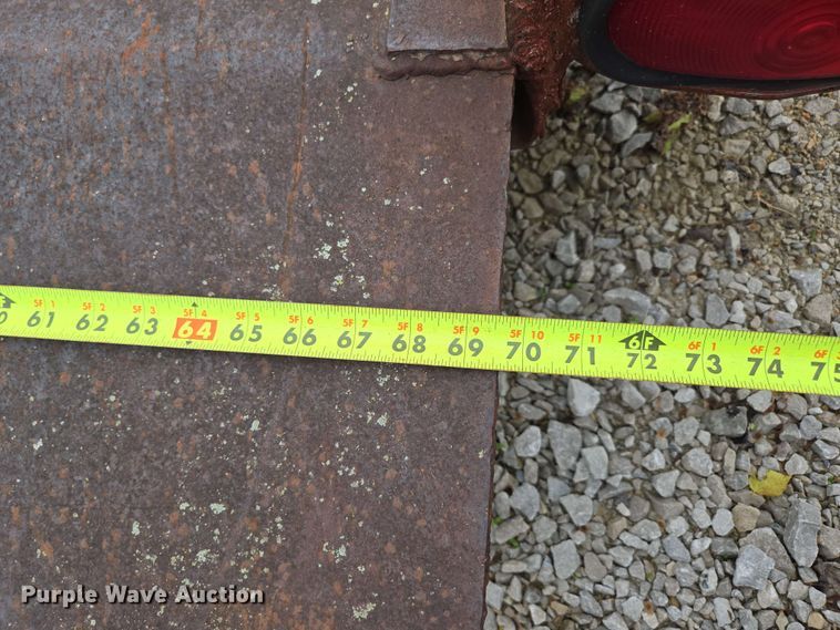 image for item EN3688 1986 The Charles Machine Works S4A tilt deck utility trailer