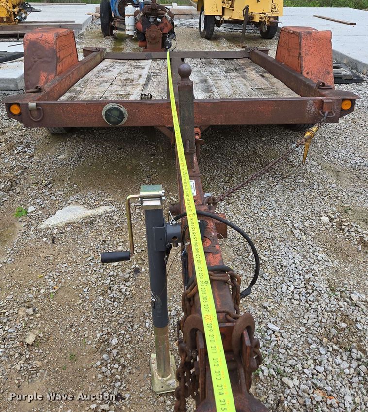 image for item EN3688 1986 The Charles Machine Works S4A tilt deck utility trailer