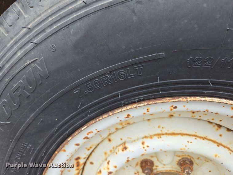 image for item EN3688 1986 The Charles Machine Works S4A tilt deck utility trailer