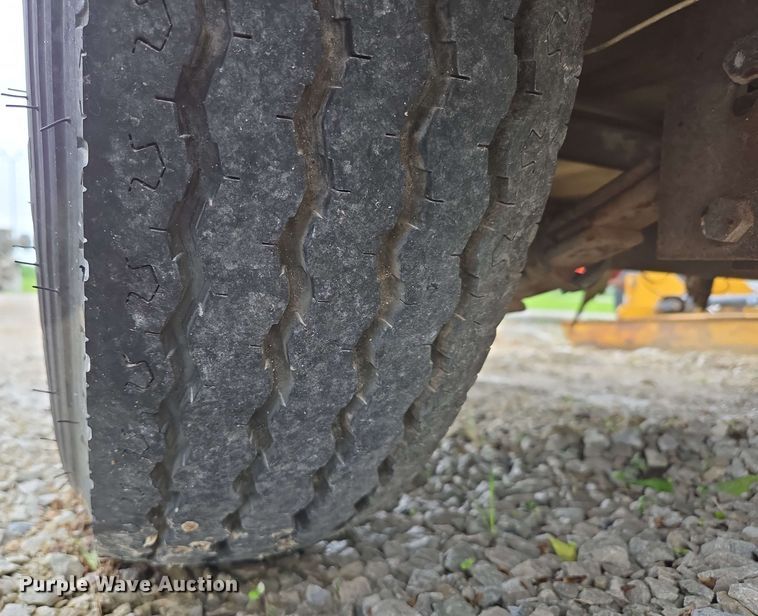 image for item EN3688 1986 The Charles Machine Works S4A tilt deck utility trailer