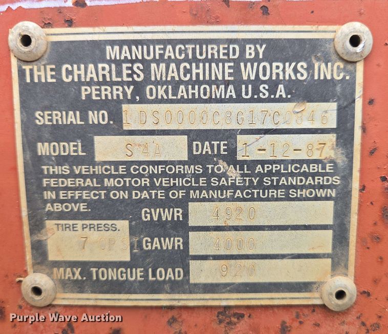 image for item EN3688 1986 The Charles Machine Works S4A tilt deck utility trailer