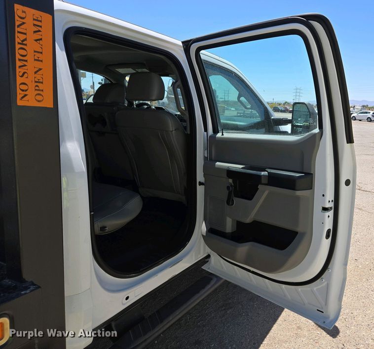 image for item YA0499 2019 Ford F350 Super Duty Crew Cab flatbed pickup truck