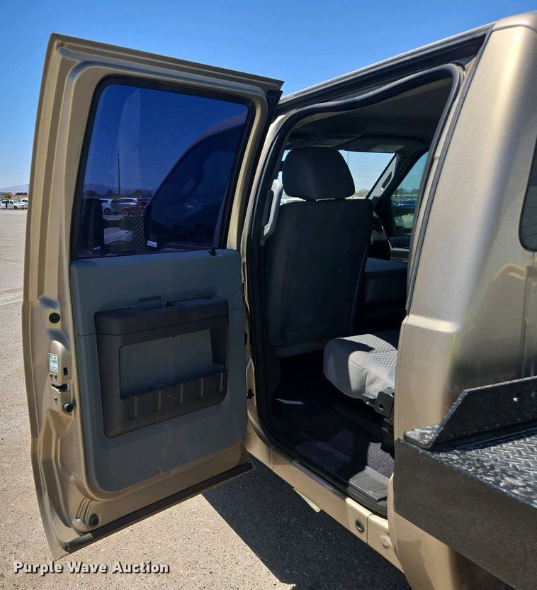 image for item YA0500 2012 Ford F450 Super Duty Crew Cab flatbed truck