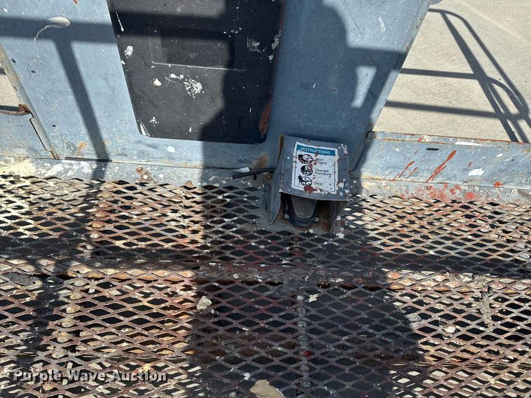 image for item DT0703 2004 Genie S-65 4x4 boom lift